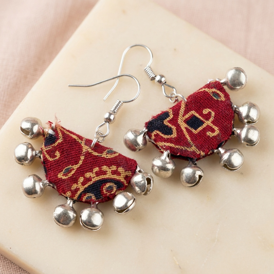Handmade red, mustard & navy block-print fabric ghungroo dangle earrings by KEVILAGU with silver bell fringe