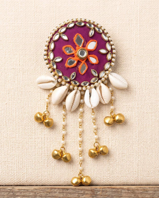 Rangili magenta mirror hair brooch with orange floral embroidery and cowrie shell detailing