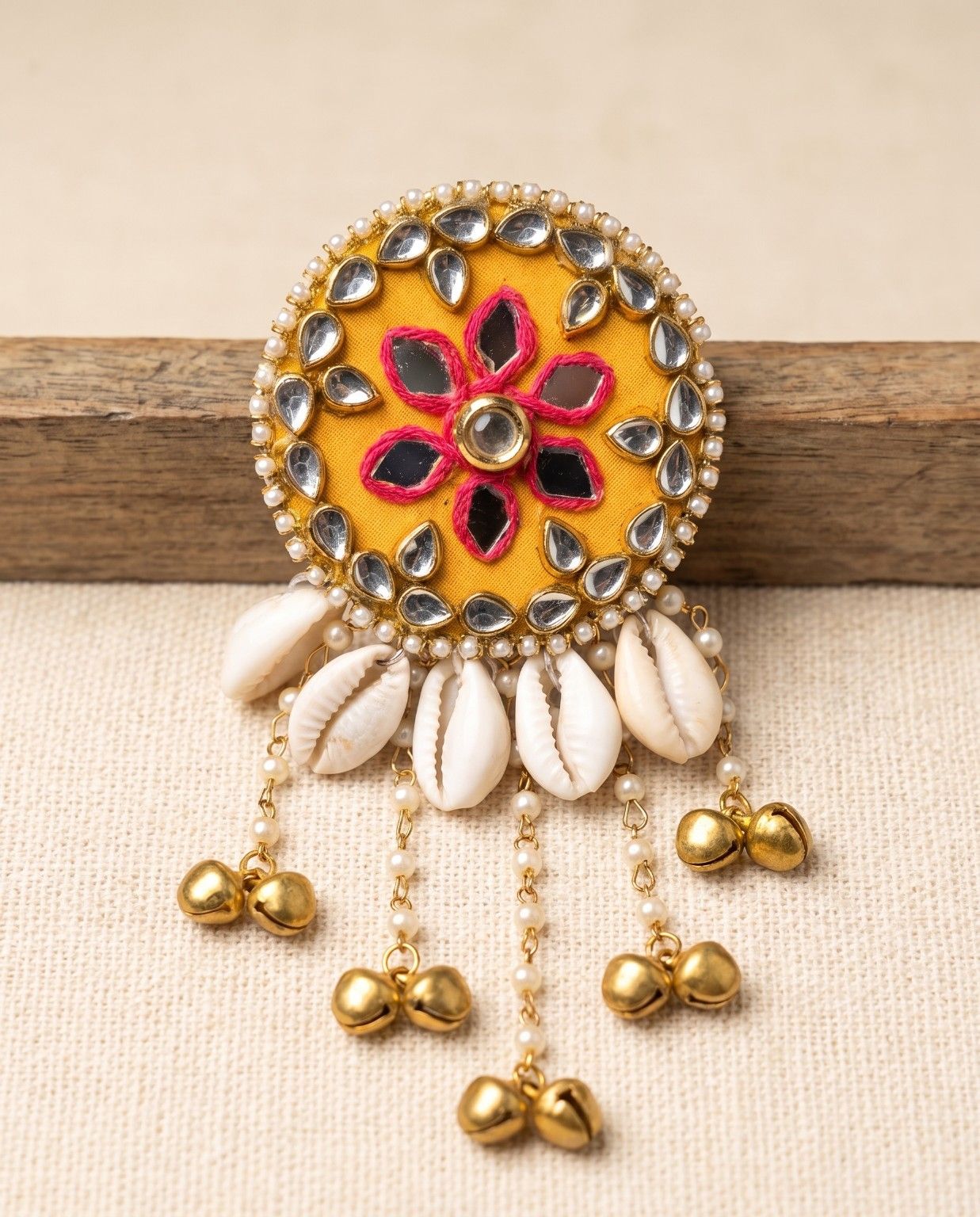 Kanak mustard yellow mirror hair brooch with cowrie shells, pearls and golden ghungroo