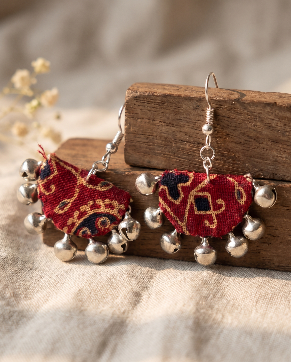 Handmade red, mustard & navy block-print fabric ghungroo dangle earrings by KEVILAGU with silver bell fringe