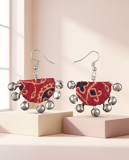 Handmade red, mustard & navy block-print fabric ghungroo dangle earrings by KEVILAGU with silver bell fringe