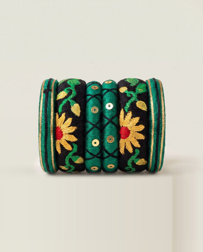 Green and black silk thread bangle set with embroidered sunflowers and gold sequins