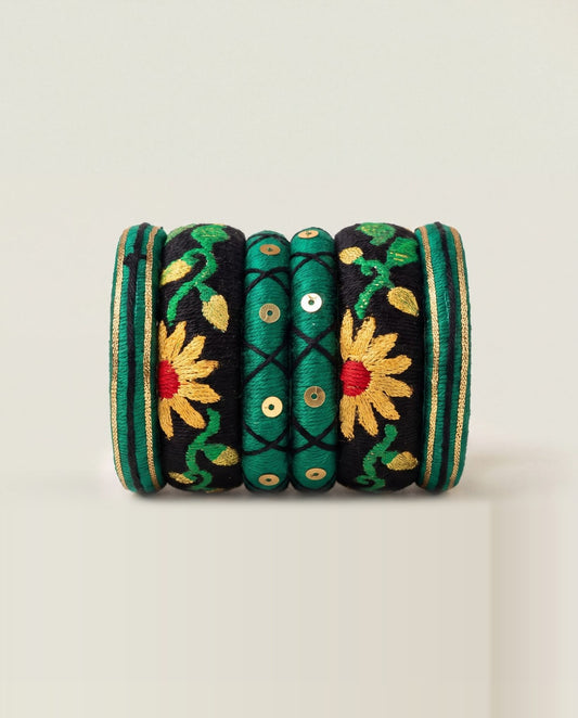 Green and black silk thread bangle set with embroidered sunflowers and gold sequins