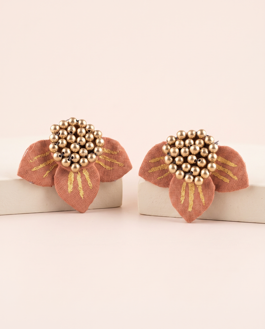 Handmade peach fabric floral stud earrings by KEVILAGU with gold stripe detailing and gold bead cluster