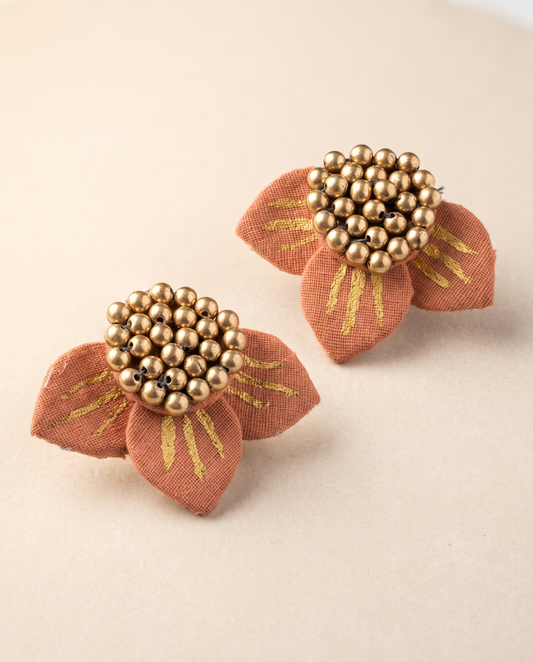 Handmade peach fabric floral stud earrings by KEVILAGU with gold stripe detailing and gold bead cluster