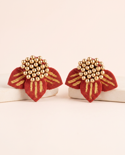 Handmade red fabric floral stud earrings by KEVILAGU with gold thread detailing and gold bead cluster