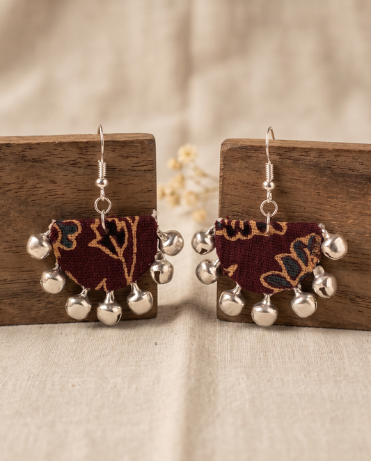 Handmade maroon, mustard & navy floral block-print fabric ghungroo dangle earrings by KEVILAGU with silver bell fringe