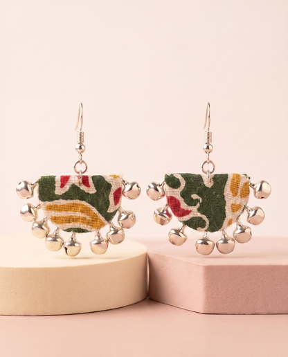 Handmade green, white, mustard & red multicolor block-print fabric ghungroo dangle earrings by KEVILAGU with silver bell fringe