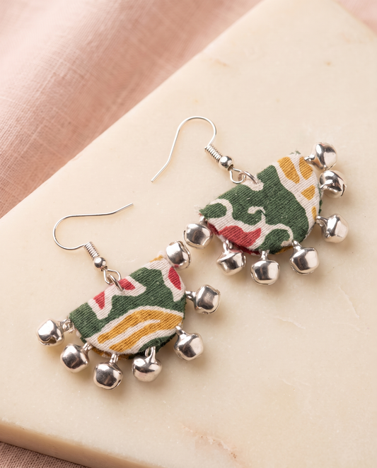 Handmade green, white, mustard & red multicolor block-print fabric ghungroo dangle earrings by KEVILAGU with silver bell fringe