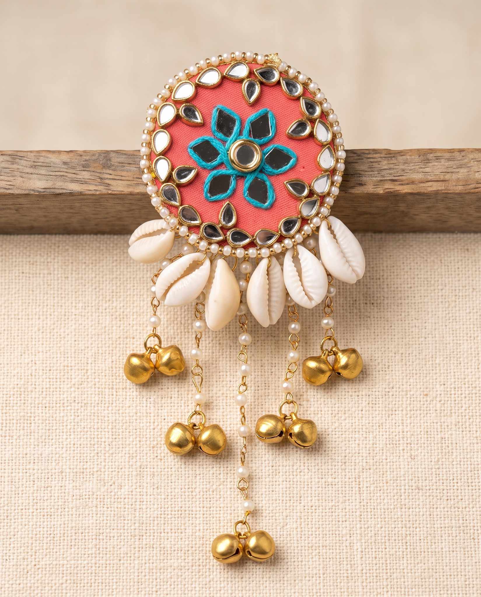 Coral-red mirror work hair brooch with turquoise floral embroidery and shell tassels"