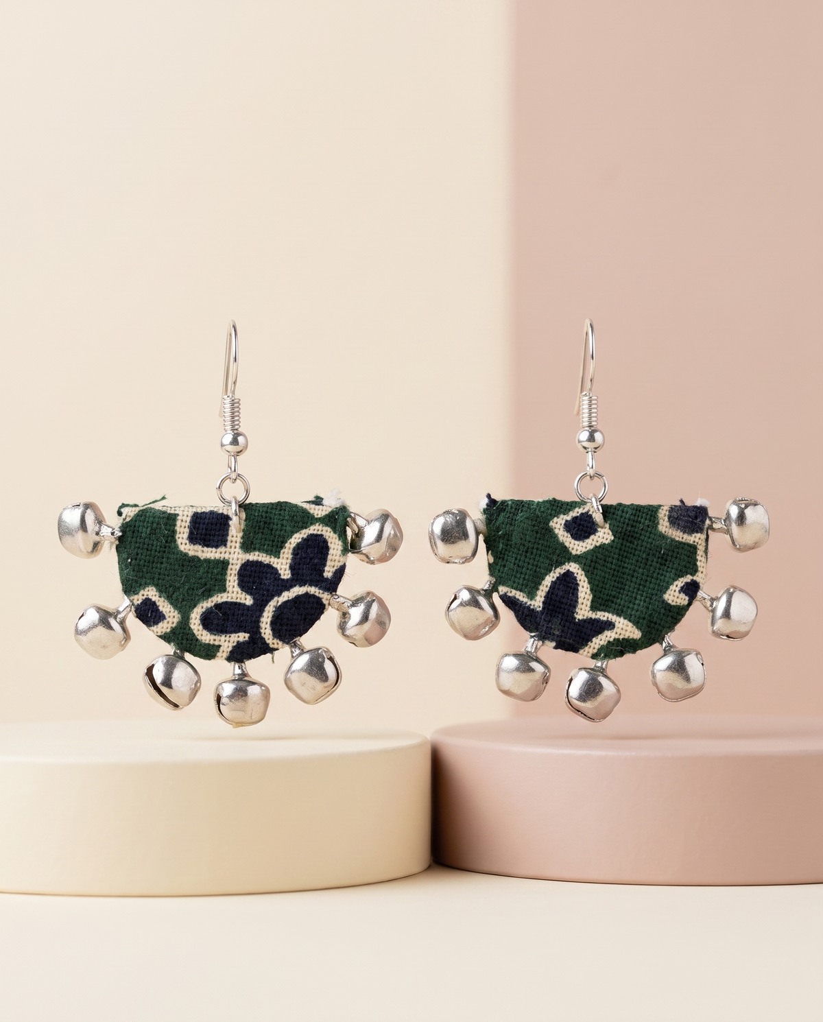Handmade green, navy & beige block-print fabric ghungroo dangle earrings by KEVILAGU with silver bell fringe