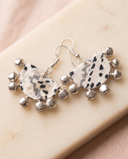 Handmade white, grey & black abstract print fabric ghungroo dangle earrings by KEVILAGU with silver bell fringe