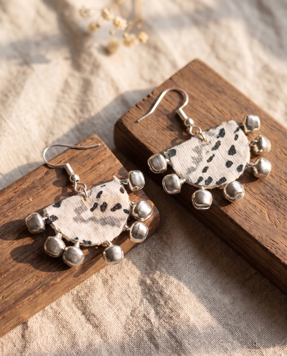 Handmade white, grey & black abstract print fabric ghungroo dangle earrings by KEVILAGU with silver bell fringe