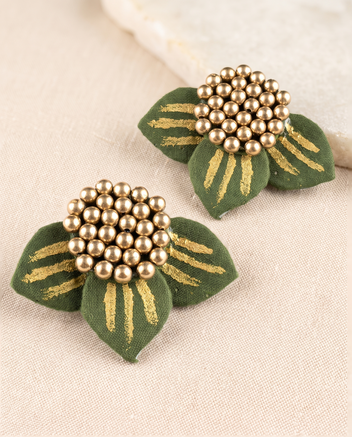 Handmade olive green fabric floral stud earrings by KEVILAGU with gold thread detailing and gold bead cluster