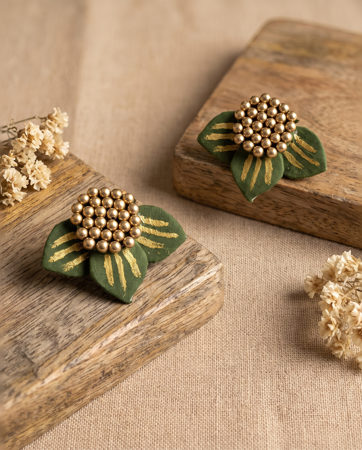 Handmade olive green fabric floral stud earrings by KEVILAGU with gold thread detailing and gold bead cluster
